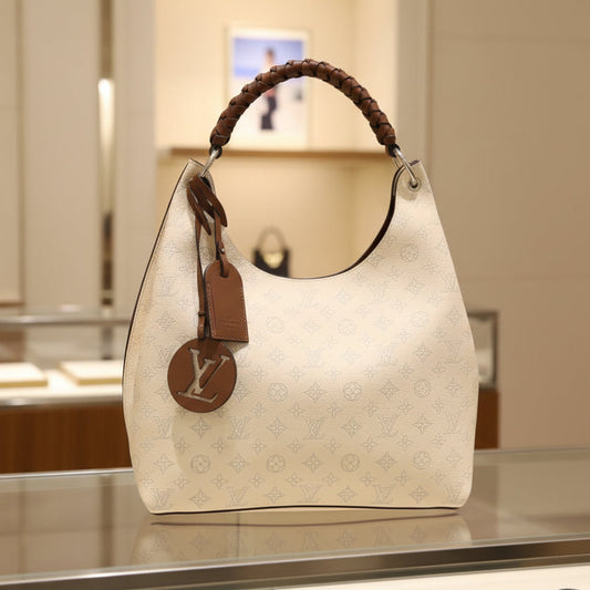 Louis Vuitton Carmel Hobo Mahina Leather Creme Off-White Shoulder Bag Pre-Owned  – Pristine Condition | L’LUXE Authentic’s
