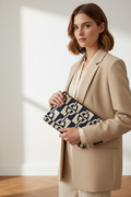 Hermès Trousse Flat GM Chaine d’Ancre Canvas Navy Ivory Pouch – Previously Owned Authentic