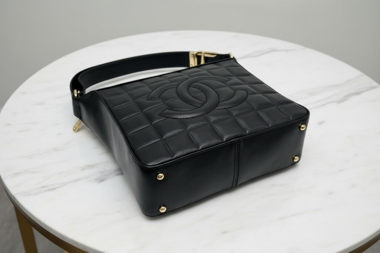 Chanel is CC Semi-Shoulder Bag Black Leather Gold Hardware Previously Owned Authentic