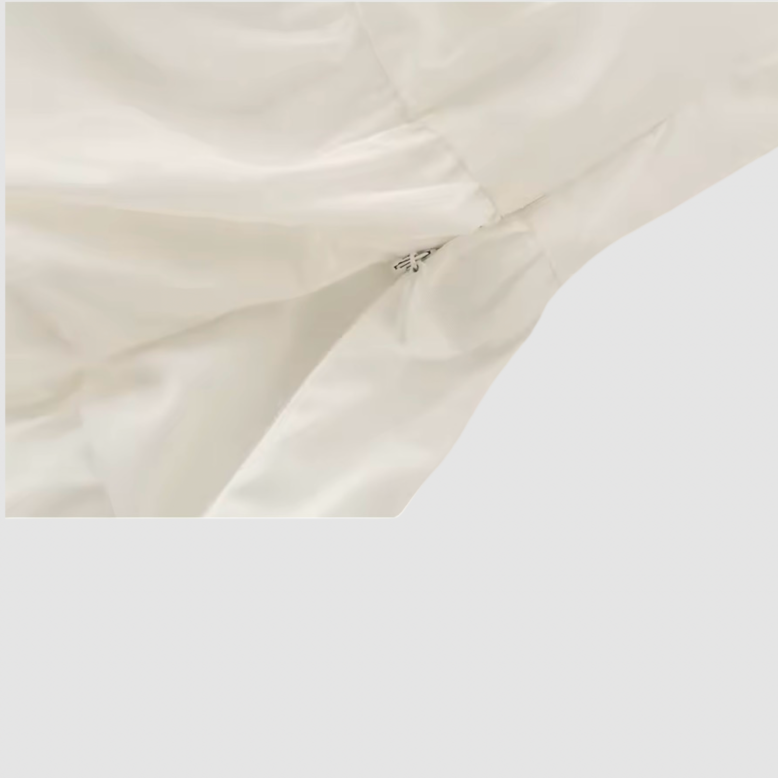 Sleeveless Pleated Peplum Top Bow Detail