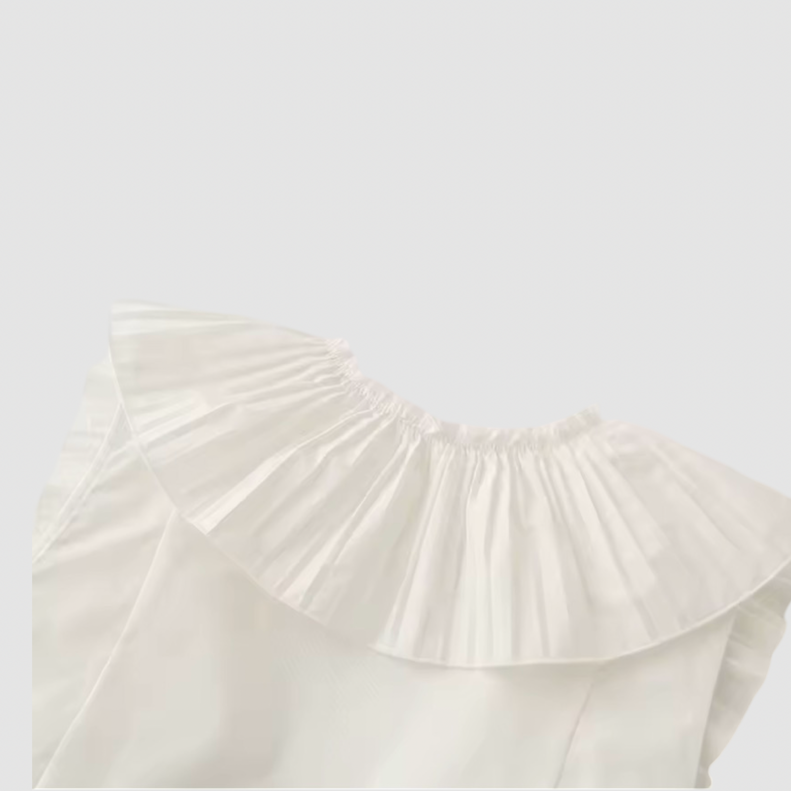 Sleeveless Pleated Peplum Top Bow Detail